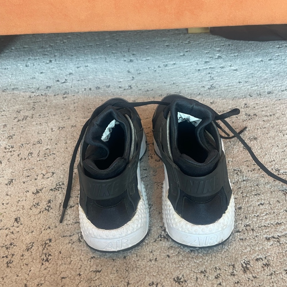Nike Air Huarache Run sneaker in an all-black colorway Black and White Sneakers - Picture 3 of 5